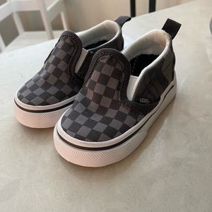 Toddler size 4 checkered vans. Velcro opening. Never worn